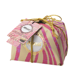 Gift box with pink and gold striped design and 'Muzzi' branding on a white background