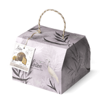 Decorative box with a label featuring nature-themed design on a white background