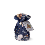 Navy blue gift bag with floral and animal designs, tied with a ribbon, on a white background.