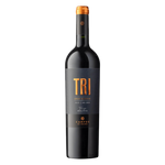 A bottle of Campos de Solana Tri Varietal Gran Reserva Tinto with a dark glass body and a black label featuring bold gold “TRI” lettering, set against a black background.
