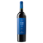 A bottle of Campos de Solana Único Reserva Tannat with a dark glass body and a bold blue label featuring the word “Único” and Tannat, from Tarija, Bolivia, set against a black background.