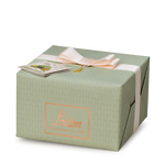 Green gift box with a pink ribbon and card on a white background