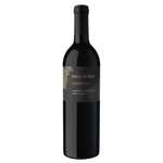 A bottle of Paul Hobbs Coombsville Cabernet Sauvignon with a dark glass body and a black label featuring gold lettering, set against a black background.