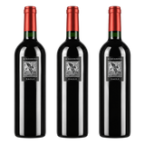 Three bottles of Screaming Eagle Cabernet Sauvignon with dark glass bodies, black labels featuring an eagle illustration, and red foil capsules, displayed against a black background.