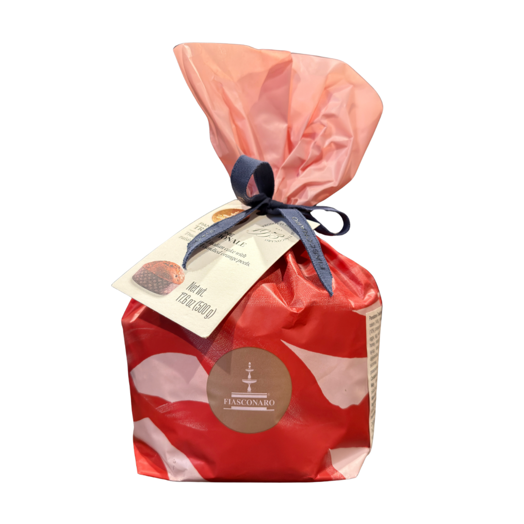 Gift bag with a red base and pink top, tied with a blue ribbon, on a white background.